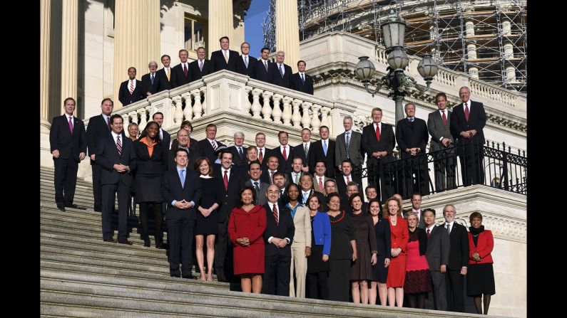 Newly elected members of the U.S. House of Representatives pose for a group photo on Capitol Hill on Tuesday, November 18. They will take office in January.