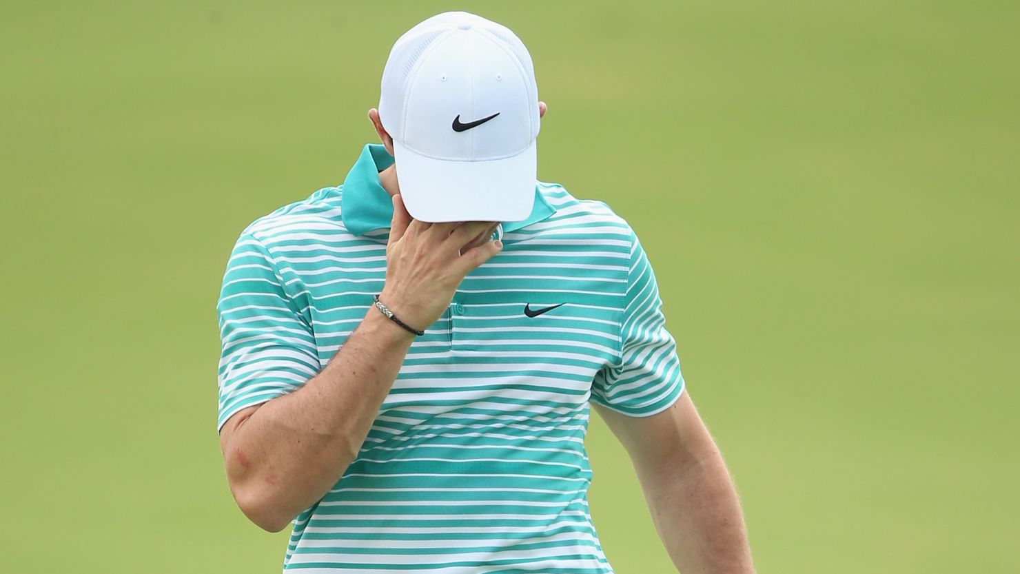 Rory McIlroy slipped back into a tie for second after a two-under-par 70 at the World Tour Championship.