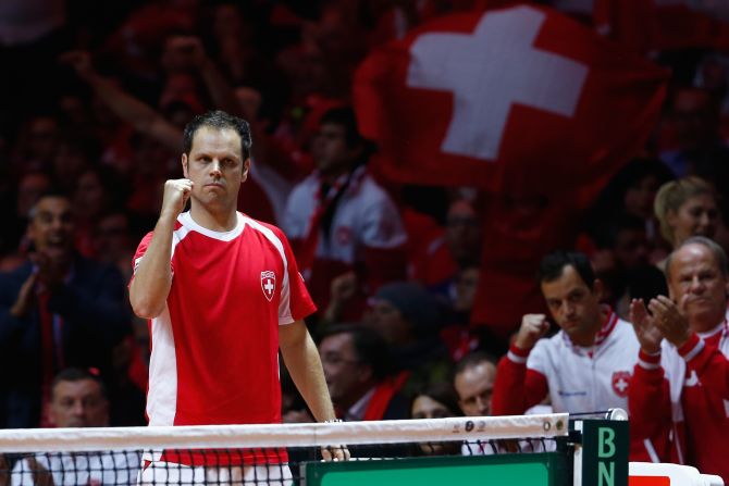 The Swiss team watched from the sidelines as Federer and Wawrinka wrapped up a 6-3, 7-5, 6-4 win.