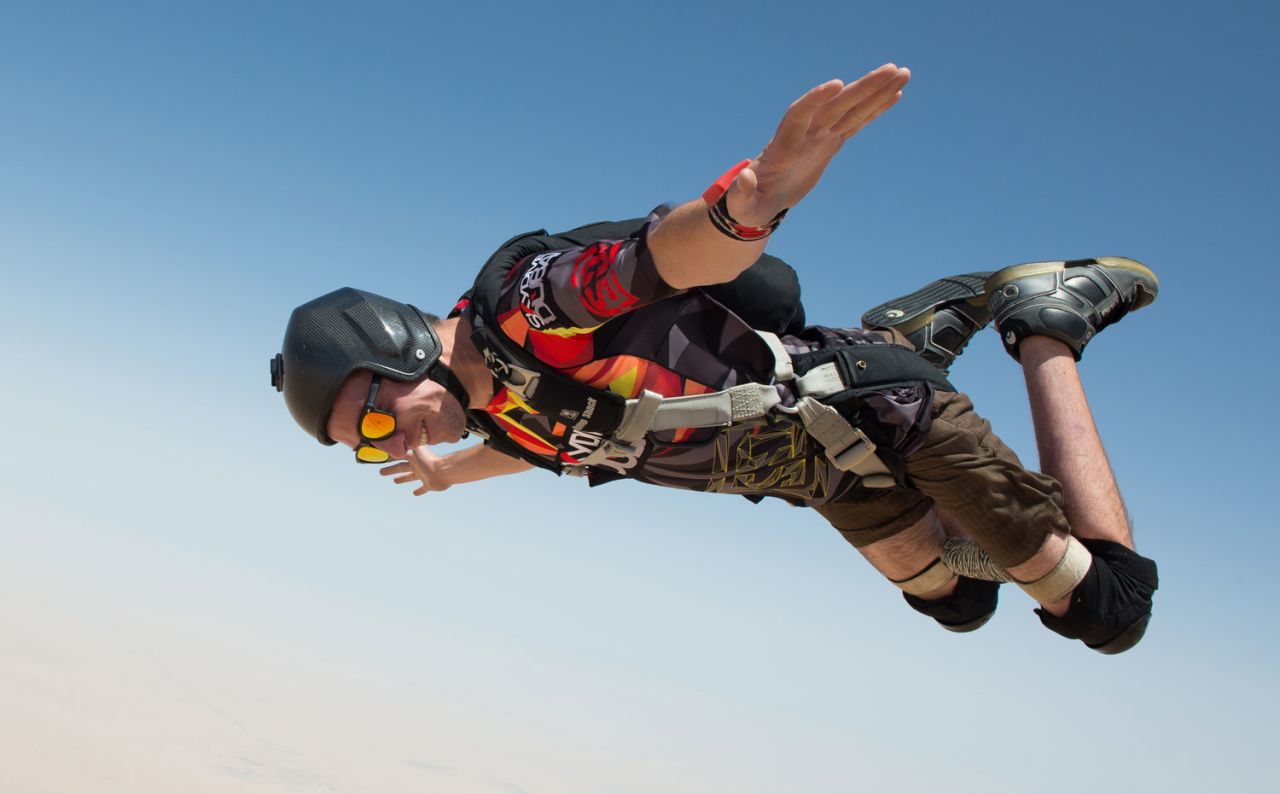 His injuries didn't stop him. He's taken up the sport again and secured a job at the busiest skydiving center in the Middle East.