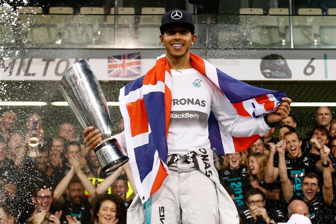 Winner Mercedes' British driver Lewis Hamilton with the trophy on the  News Photo - Getty Images