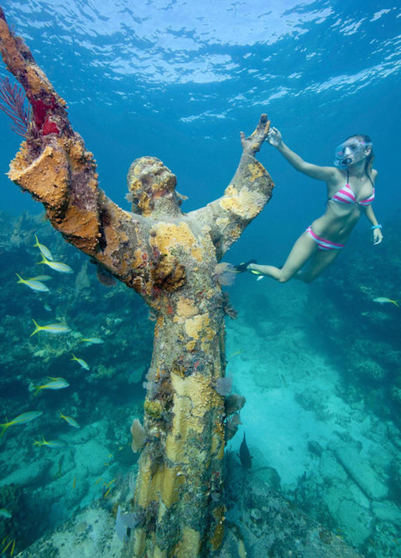 Sitting seven meters below the water surface, Christ of the Abyss is located in Key Largo, Florida. It's visible to swimmers but for a detailed look at the carvings it's easiest to slap on some scuba diving gear. 