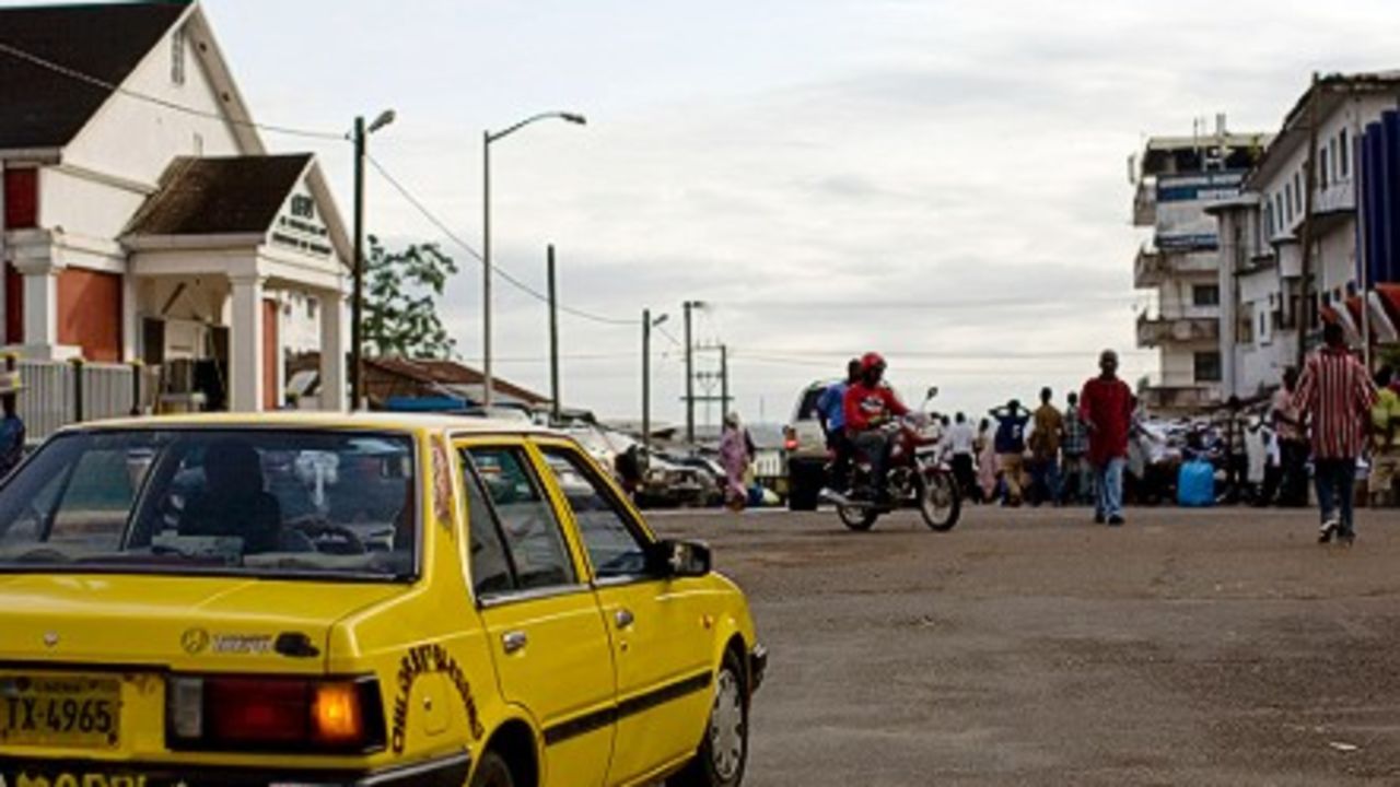George Watkins drives a taxi in Monrovia.