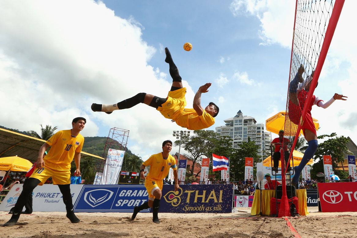 Thailand's Phakping Dejaroen plays a shot during a sepak takraw match Sunday, November 23, at the Asian Beach Games in Phuket, Thailand. Thailand defeated Indonesia in the men's regu final.