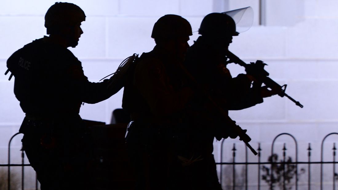 Police take position during clashes with protesters on November 24.