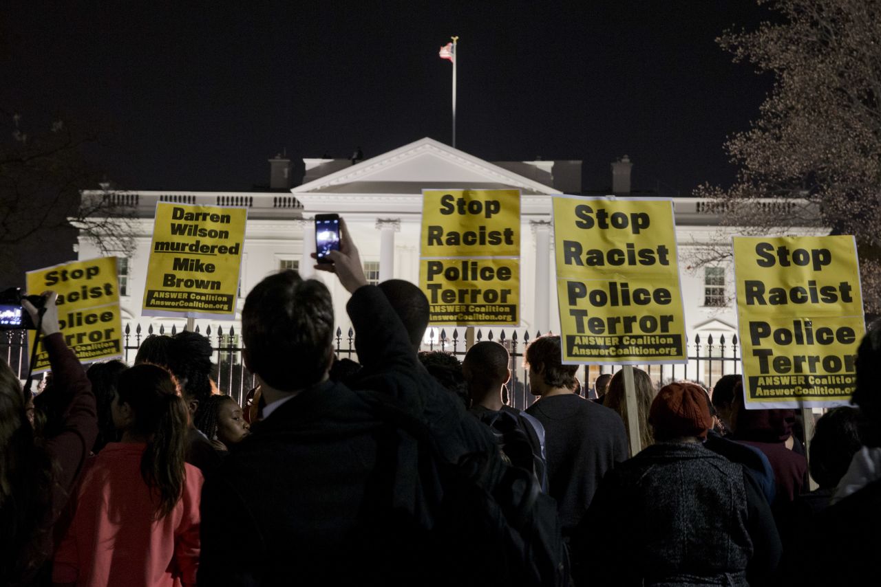 A crowd in Washington gathers outside the White House on November 24.