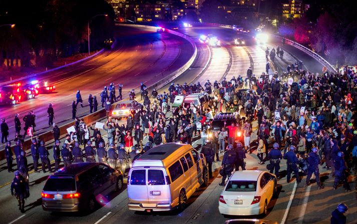 Protesters block Interstate 580 in Oakland on November 24.