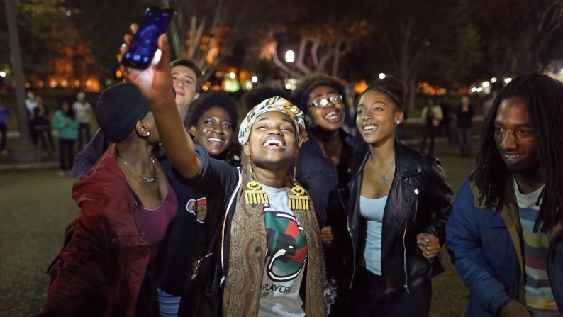 Protesters sing, chant and dance outside the White House on Tuesday, November 25, after it was announced that Darren Wilson, a police officer in Ferguson, Missouri, would not be indicted in the shooting death of Michael Brown. The grand jury's decision not to indict Wilson <a href="http://www.cnn.com/2014/11/25/justice/gallery/national-ferguson-protests/index.html">prompted demonstrations across the country.</a>