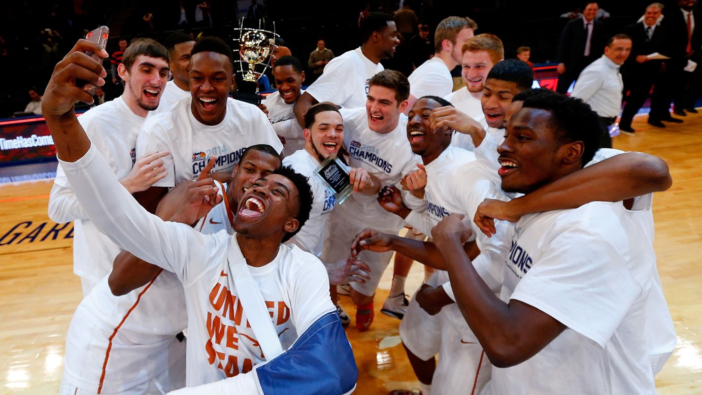 The Texas Longhorns basketball team takes a selfie in New York's Madison Square Garden after defeating California to win the 2K Classic on Friday, November 21.