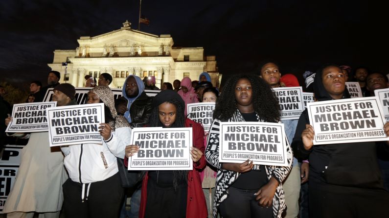 People march in Newark, New Jersey, on November 25.