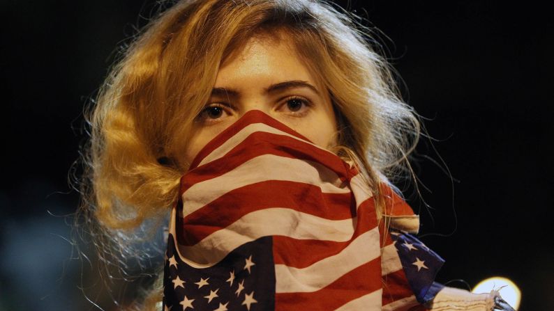 A woman joins a rally near Los Angeles police headquarters on November 25.