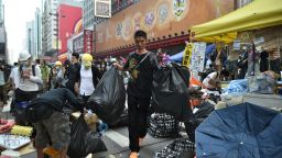 Protesters pack their belongings ahead of an expected clearance by bailiffs and police at a pro-democracy protest site in the Mong Kok district of Hong Kong on November 26.
