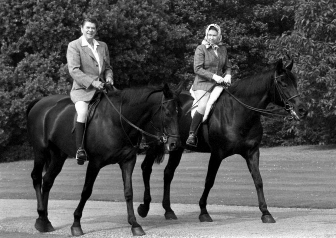 US President Ronald Reagan goes riding in Windsor Home Park while staying as a guest of the Queen in 1982.