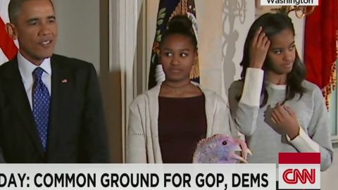 Sasha and Malia Obama attend turkey pardoning.