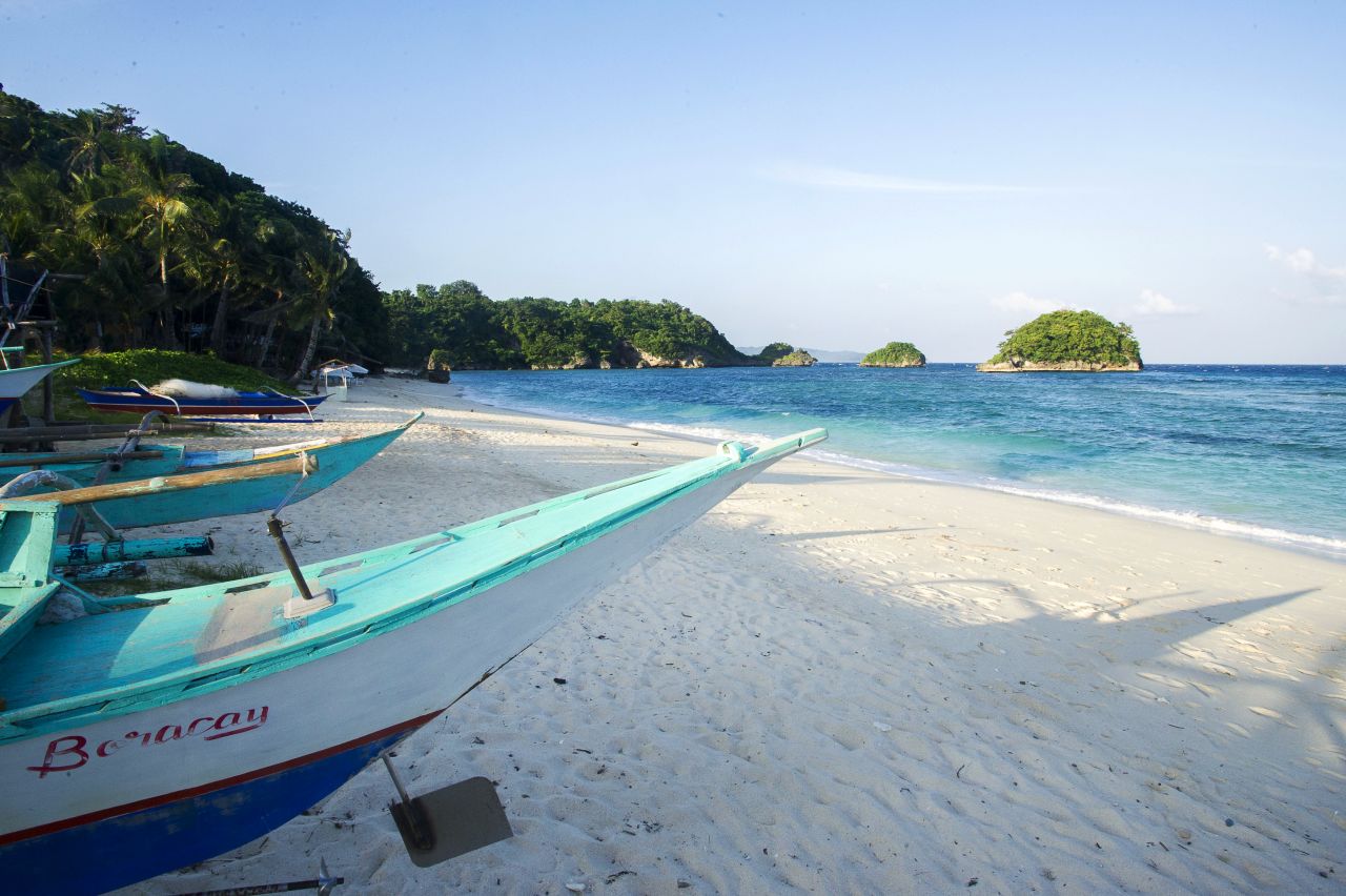 The small secluded beach is an escape from the popular White Beach. During off season -- November to April, it's lined with colorful fishing boats under repair.