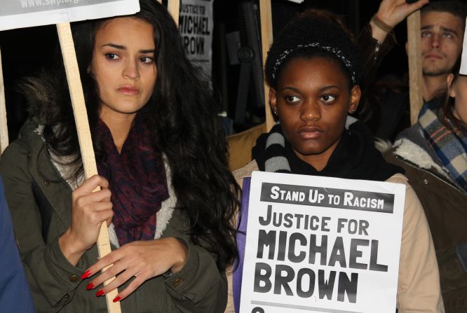 Hundreds of protesters gathered outside the U.S. Embassy in London on November 26, 2014, in solidarity with the family of Michael Brown and the people of Ferguson, Missouri.