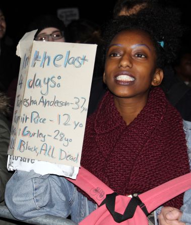 Several hours after the rally began, dozens of protesters marched from the embassy along New Bond Street, home to some of London's most upscale designer stores -- and into Oxford Street, one of the capital's biggest shopping centers.