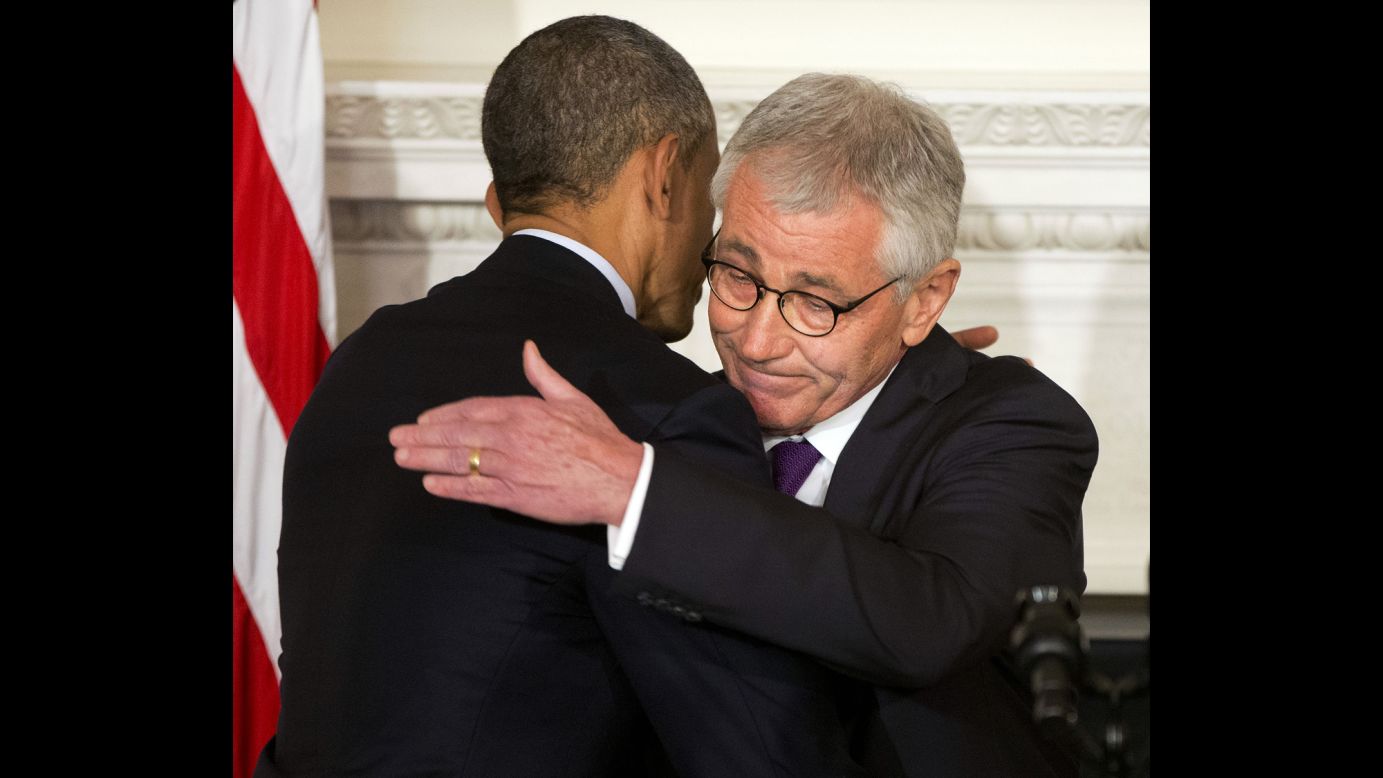 U.S. President Barack Obama, left, embraces Defense Secretary Chuck Hagel after speaking about Hagel's resignation Monday, November 24, in Washington. Hagel, who held the post since February 2013, <a href="http://www.cnn.com/2014/11/24/politics/defense-secretary-hagel-to-step-down/index.html">was forced out by Obama,</a> CNN confirmed from several sources.