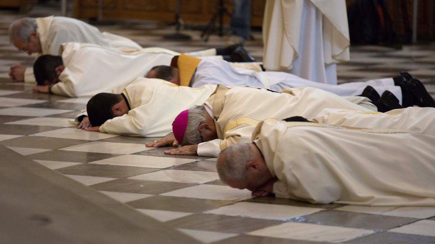 The Archbishop of Granada, Spain, and other priests prostrate in front of the cathedral's main altar on Sunday, November 23. They were "asking forgiveness for the sins of Church, for all of the scandals that have, or might have, occurred among us," according to the Granada Archdiocese website. The next day, Spanish police <a href="http://www.cnn.com/2014/11/24/world/europe/spain-sexual-abuse-priest-arrests/index.html">arrested three Catholic priests and a religion teacher</a> on suspicion of abusing a minor, Spain's interior minister announced.