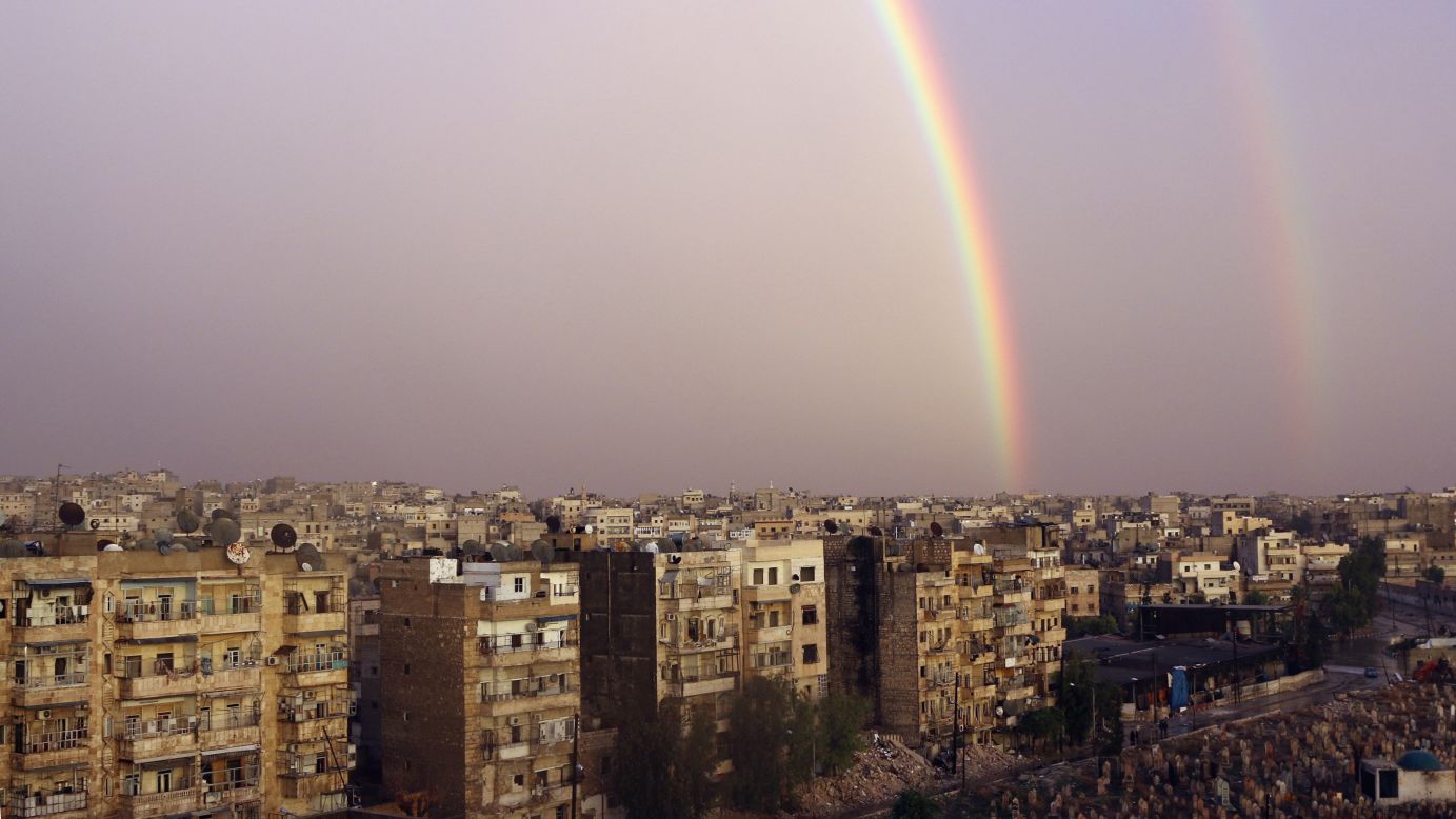 A double rainbow is seen over damaged buildings in Aleppo, Syria, on Friday, November 21. <a href="http://www.cnn.com/2014/11/21/world/gallery/week-in-photos-1121/index.html">See last week in 34 photos</a>