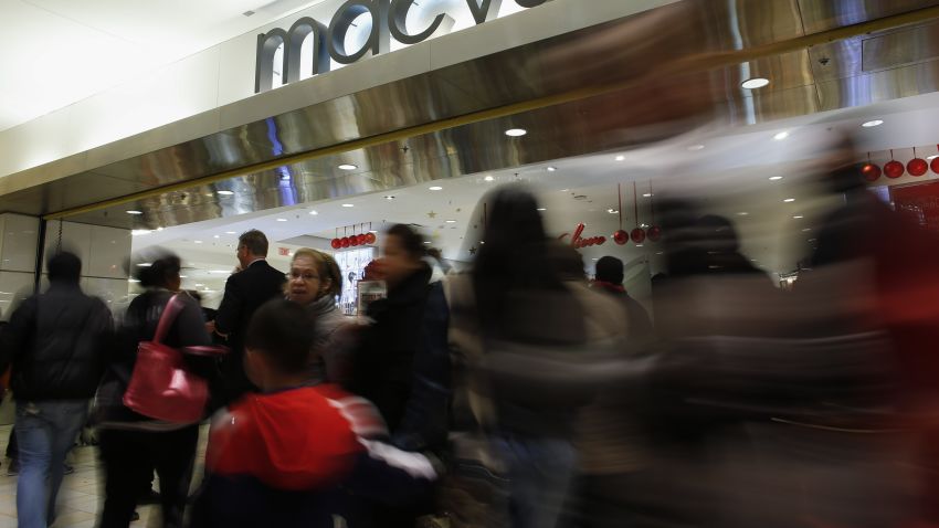 Caption:NEWPORT, NJ - NOVEMBER 27: People enter to Macy's store at the Newport Mall on November 27, 2014 in Jersey City, New Jersey. Black Friday sales, which now begin on the Thursday of Thanksgiving, continue to draw shoppers out for deals and sales. (Photo by Kena Betancur/Getty Images)
