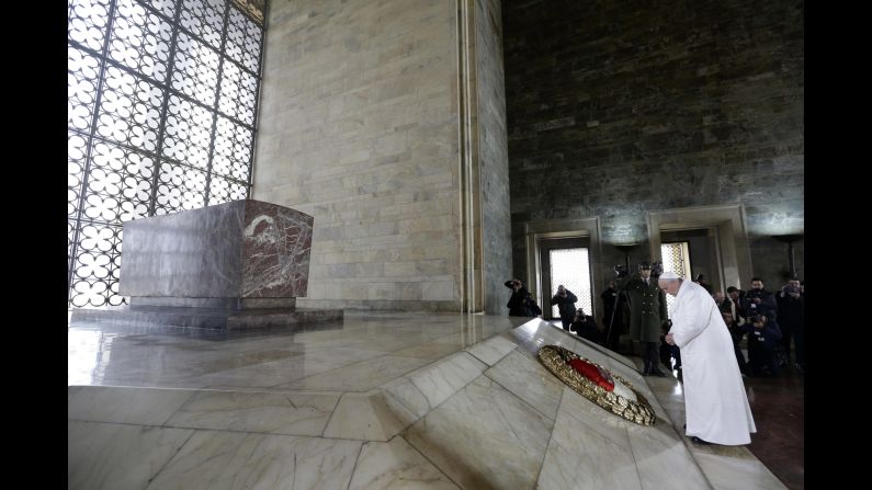 The Pope pauses after laying a wreath at the Ataturk Mausoleum on November 28.