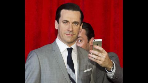 Actor Jon Hamm takes a selfie with his wax figure after it was unveiled Friday, May 9, at Madame Tussauds in New York.