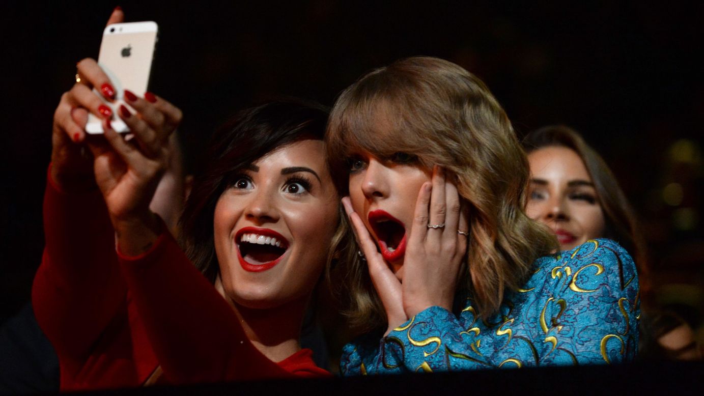 Recording artists Demi Lovato, left, and Taylor Swift take a selfie at the MTV Video Music Awards on Sunday, August 24. Lovato <a href="http://instagram.com/p/sGsETpOKp6/?modal=true" target="_blank" target="_blank">posted the selfie</a> to her Instagram account.