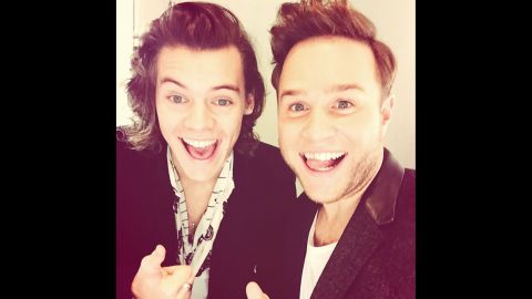 Singer Olly Murs, right, <a href="http://instagram.com/p/vbKn5Inyat/?modal=true" target="_blank" target="_blank">takes a selfie</a> with One Direction's Harry Styles on Saturday, November 15.