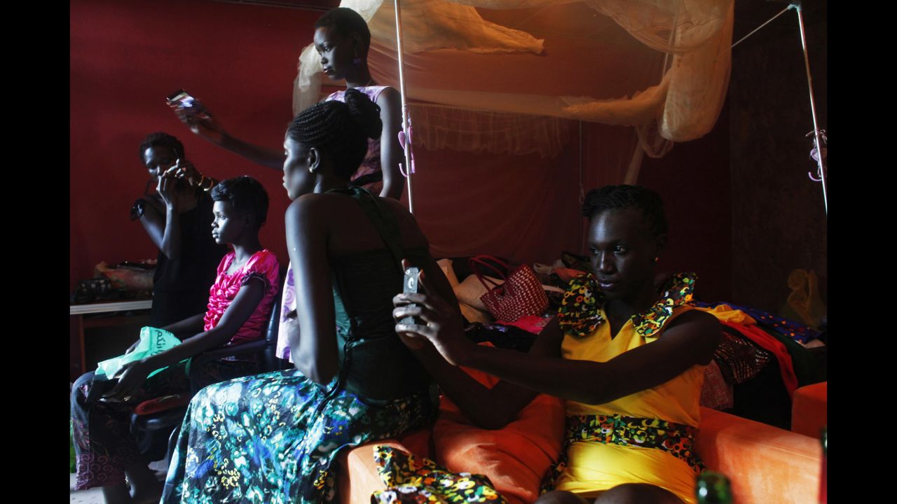 Models take selfies Saturday, August 9, during the Festival of Fashion and Arts for Peace in Juba, South Sudan.