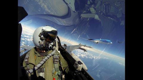 A pilot with the Royal Netherlands Air Force F-16 Demo Team posted this <a href="https://www.facebook.com/192563392398/photos/pb.192563392398.-2207520000.1417098166./10152215946312399/?type=3&theater" target="_blank" target="_blank">photo from the cockpit</a> on Sunday, June 8. To the pilot's left is a Boeing 787 Dreamliner, the first for Dutch airline Arke.