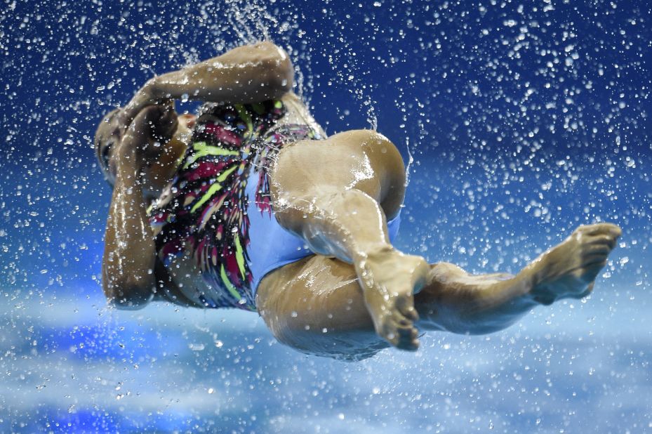 A member of Japan's synchronized swimming team twists out of the water Monday, September 22, while competing in the Asian Games in Incheon, South Korea.