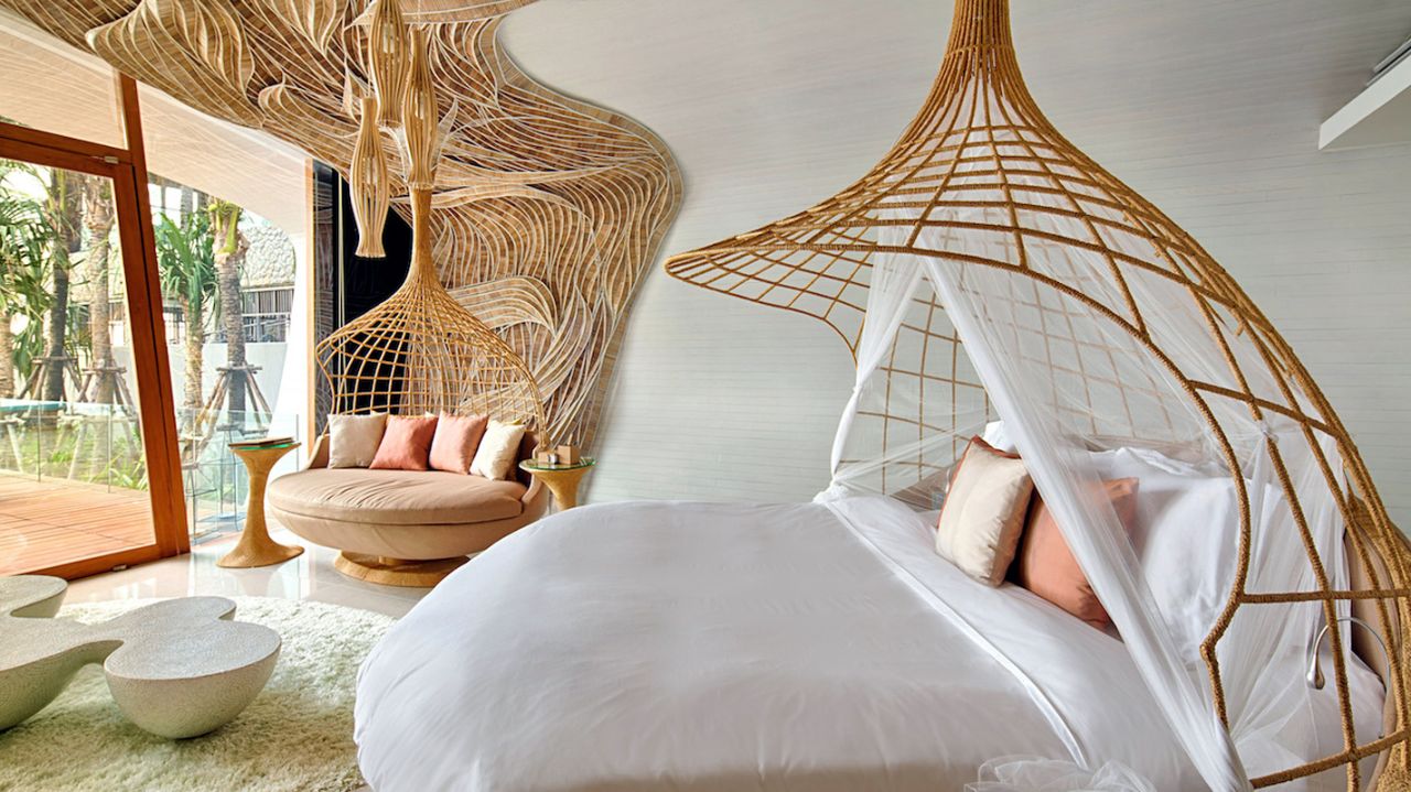 "Eclectic" is an understatement at Iniala Beach House in Phang Nga, Thailand. Ten designers created the hotel's varied spaces, leading to cocoon-like canopy beds, gold leaf-covered dome in the spa room and a "kids hotel" wing with mini-bathrobes and slippers.