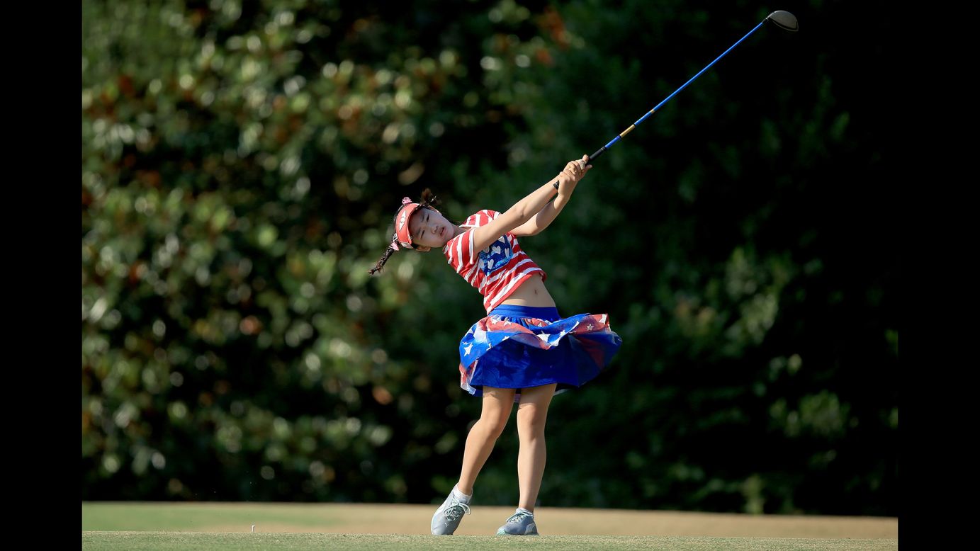 Lucy Li, who is only 11, tees off from the 16th hole during the first round of the U.S. Women's Open, which was held Thursday, June 19, in Pinehurst, North Carolina. Li missed the cut but still set a record as the youngest person ever to qualify for the tournament.