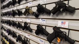 Caption:Handguns are displayed at the Ultimate Defense Firing Range and Training Center in St Peters, Missouri, some 20 miles (32 kilometers) west of Ferguson, on November 26, 2014. Paul Bastean, owner of the range, told AFP that business had grown as a result of anxiety about reaction to the jury announcement in the shooting death of 18-year-old Michael Brown. Typical sales of five to seven guns a day have risen to 20 to 30 in the last week, while gun-handling courses for November and December are fast selling out. Violence erupted in the St Louis, Missouri suburb for a second night on November 25 over the decision by a grand jury not to prosecute a white police officer for shooting dead Brown, an unarmed black teenager. AFP PHOTO/Jewel Samad (Photo credit should read JEWEL SAMAD/AFP/Getty Images)
