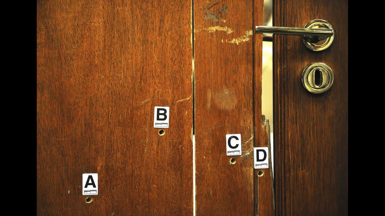 <strong>April 14:</strong> The door through which Oscar Pistorius fatally shot his girlfriend, Reeva Steenkamp, is used as evidence during his murder trial in Pretoria, South Africa. Pistorius, the first double-amputee runner to compete in the Olympics, was <a href="http://www.cnn.com/2014/03/03/africa/gallery/pistorius-2014-trial/index.html">found guilty of culpable homicide</a> -- the South African term for unintentionally, but unlawfully, killing a person. He was sentenced to five years in prison.