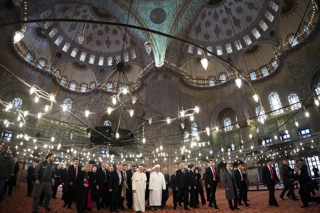 Pope Francis and Istanbul's Grand Mufti Rahmi Yaran visit the Sultan Ahmet Mosque, popularly known as the Blue Mosque, in Istanbul on November 29. 