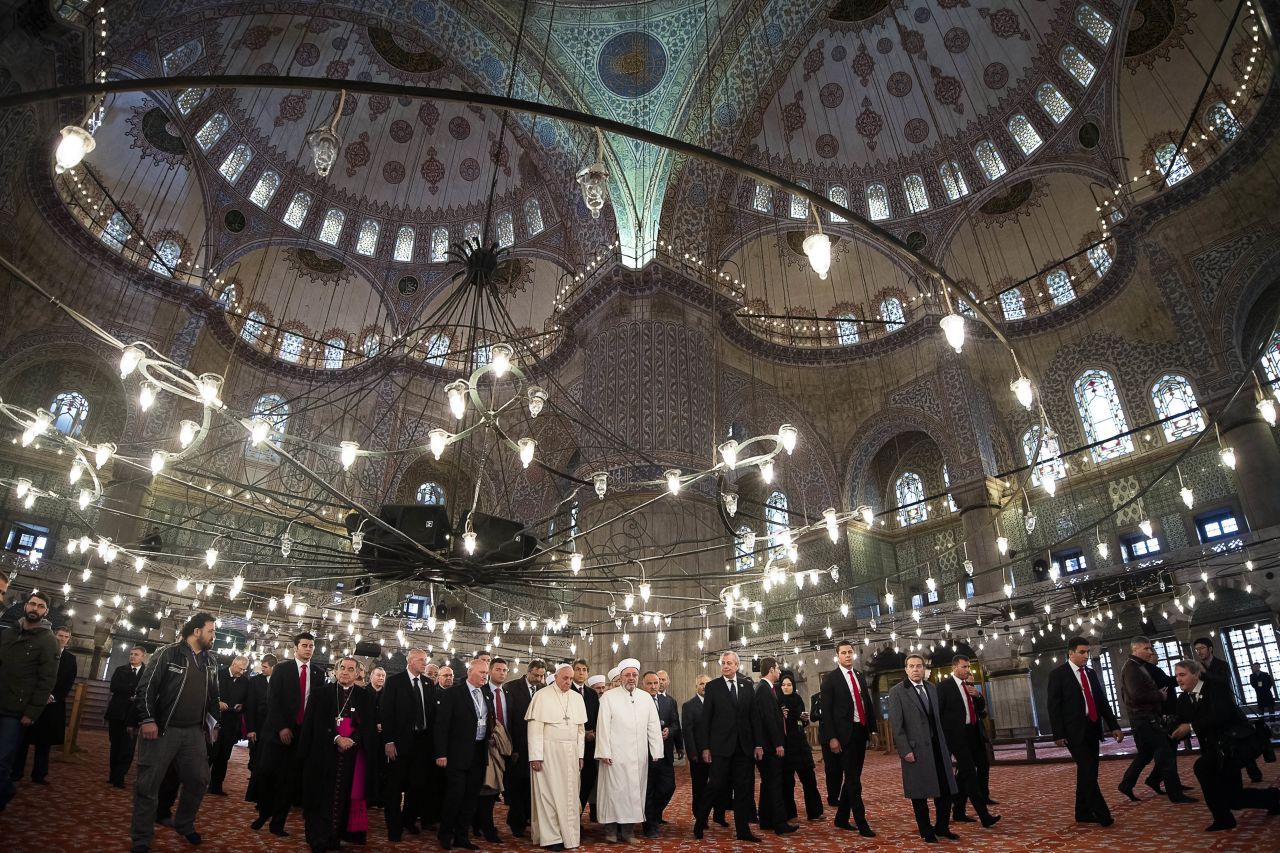 Pope Francis and Istanbul's Grand Mufti Rahmi Yaran visit the Sultan Ahmet Mosque, popularly known as the Blue Mosque, in Istanbul on November 29.