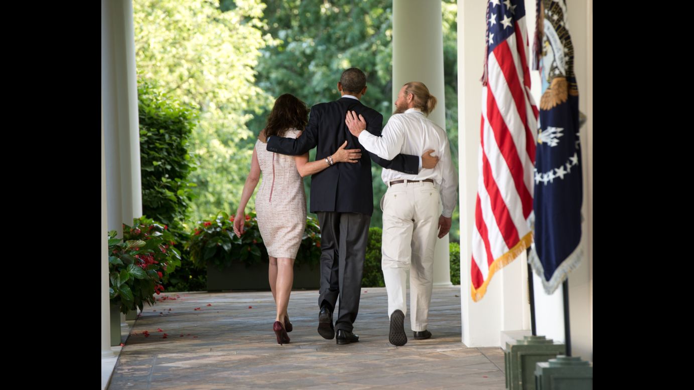 <strong>May 31:</strong> U.S. President Barack Obama, center, walks with the parents of Army Sgt. Bowe Bergdahl after making a statement at the White House about <a href="http://www.cnn.com/2014/05/31/world/asia/afghanistan-bergdahl-release/index.html">Bergdahl's release.</a> Bergdahl had been held captive in Afghanistan for nearly five years, and the Taliban released him in exchange for five U.S.-held prisoners.