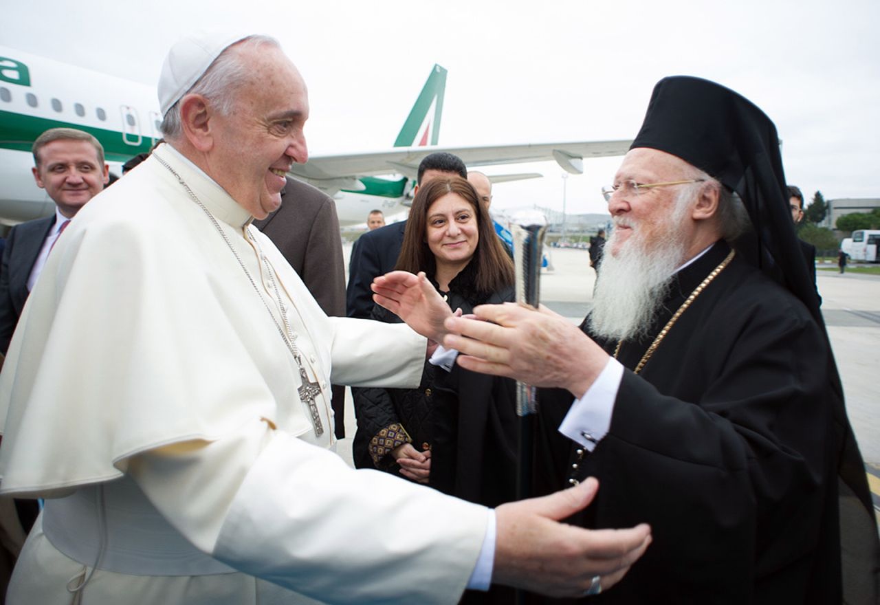 Pope Francis is welcomed by Ecumenical Patriarch Bartholomew I at the Istanbul Ataturk airport on November 29.