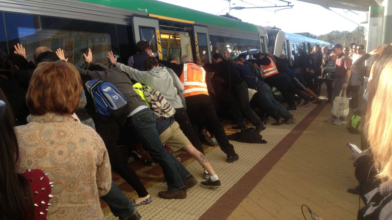 <strong>August 6:</strong> Dozens of commuters in Perth, Australia, work to rescue a man who got his leg trapped between a train and the platform. The passenger was able to wriggle free with their help.