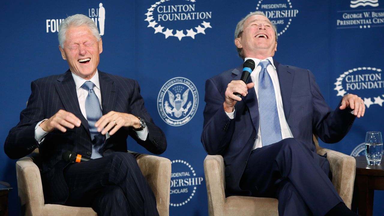 <strong>September 8:</strong> Former U.S. Presidents Bill Clinton, left, and George W. Bush laugh on stage during an event at the Newseum in Washington. The event was for a new leadership program they were launching, but <a href="http://www.cnn.com/2014/09/08/politics/clinton-bush-friendship/">they also joked with and about each other</a>, told stories about their relationship and even offered commentary about the number of selfies each is asked to take.