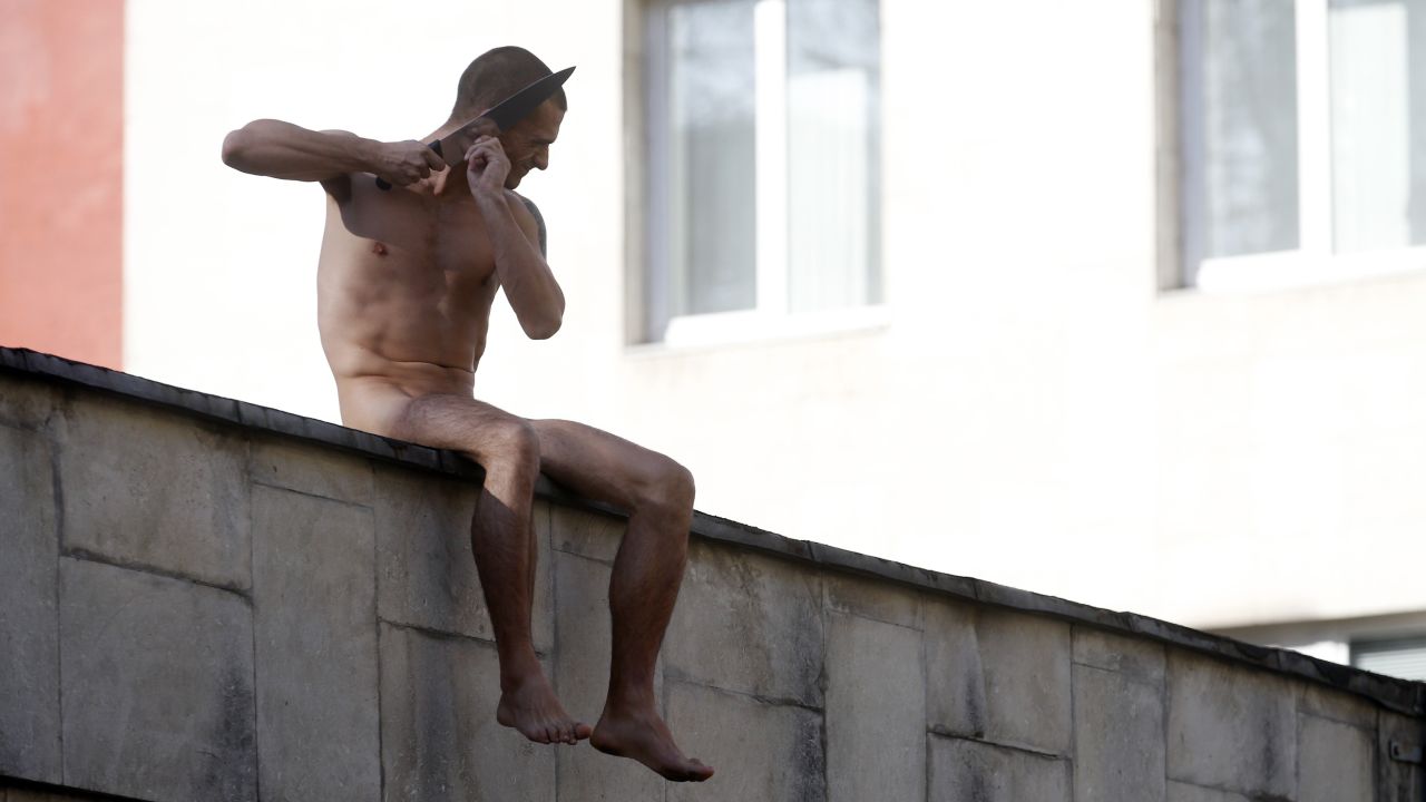 <strong>October 19:</strong> Pyotr Pavlensky cuts off a part of his earlobe while sitting on a wall enclosing the Serbsky Center, a psychiatric hospital in Moscow. Pavlensky was protesting what he said was the use of forensic psychiatry for politically motivated purposes. He said he cut off part of his earlobe to demonstrate how authorities could "cut off" an unwanted individual from society.