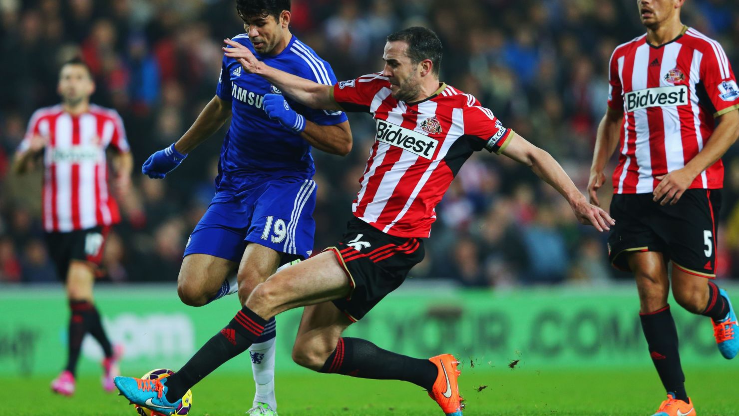  John O'Shea of Sunderland challenges Diego Costa of Chelsea during the English Premier League match between Sunderland and Chelsea.
