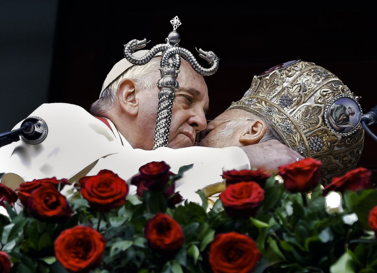 Pope Francis and Ecumenical Patriarch Bartholomew I hug each other after a holy liturgy at the Patriarchal Church of St. George in Istanbul on November 30.