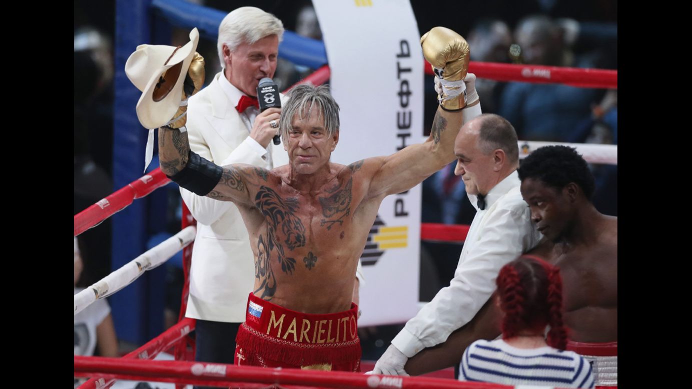 Actor Mickey Rourke celebrates after he won an exhibition boxing match Friday, November 28, in Moscow. It was his first boxing match in more than 20 years.