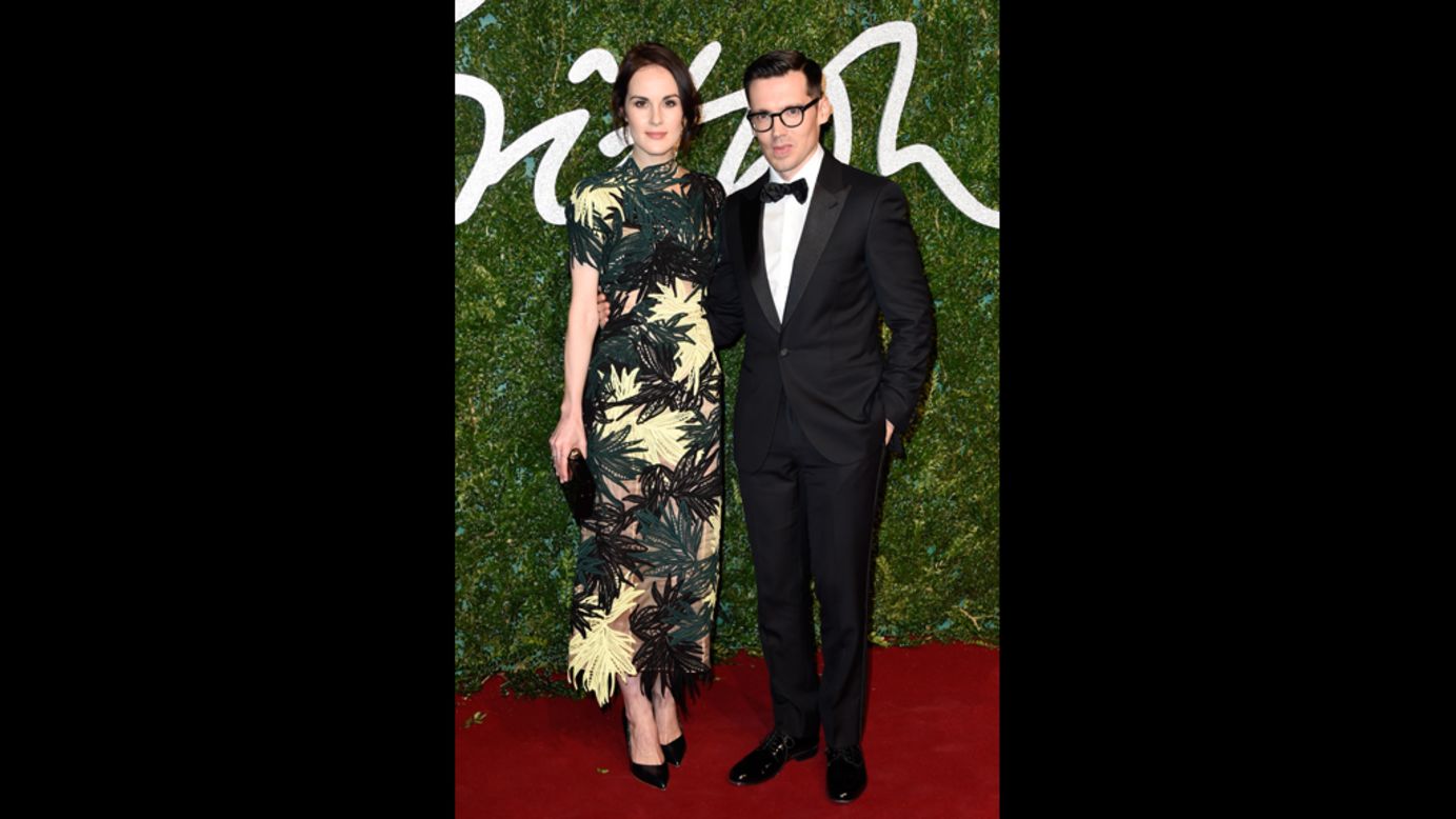 Erdem Moralioglu, here with actress Michelle Dockery, took home the award for the best womenswear designer. (Though Moralioglu is originally from Canada, his house was founded and remains based in London.)