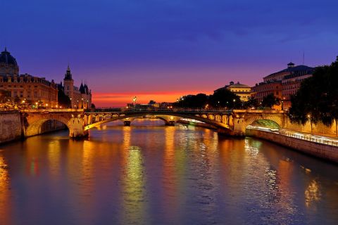 Dusk settles over the river <a href="http://ireport.cnn.com/docs/DOC-1173773">Seine</a> in Paris, France, in this HDR shot.