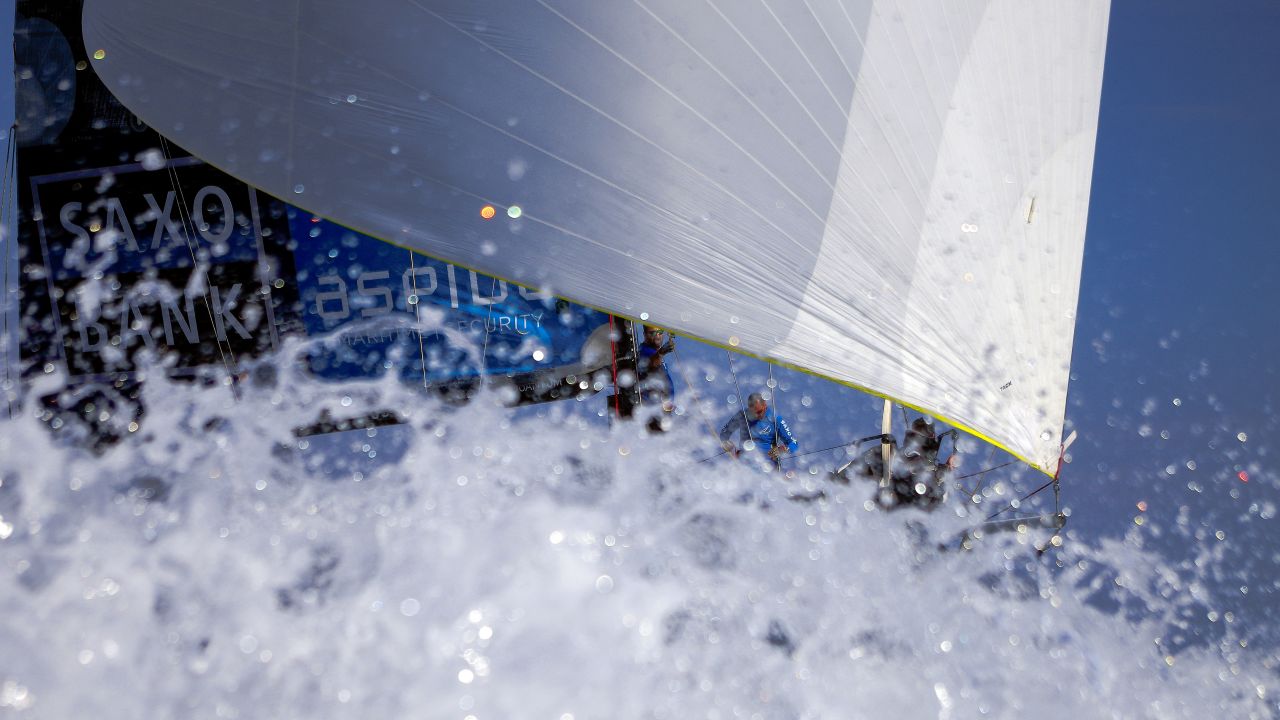 Optimum 3 Aspida Saxo Bank captured through the waves in the final leg of the Andros International race in Greece.