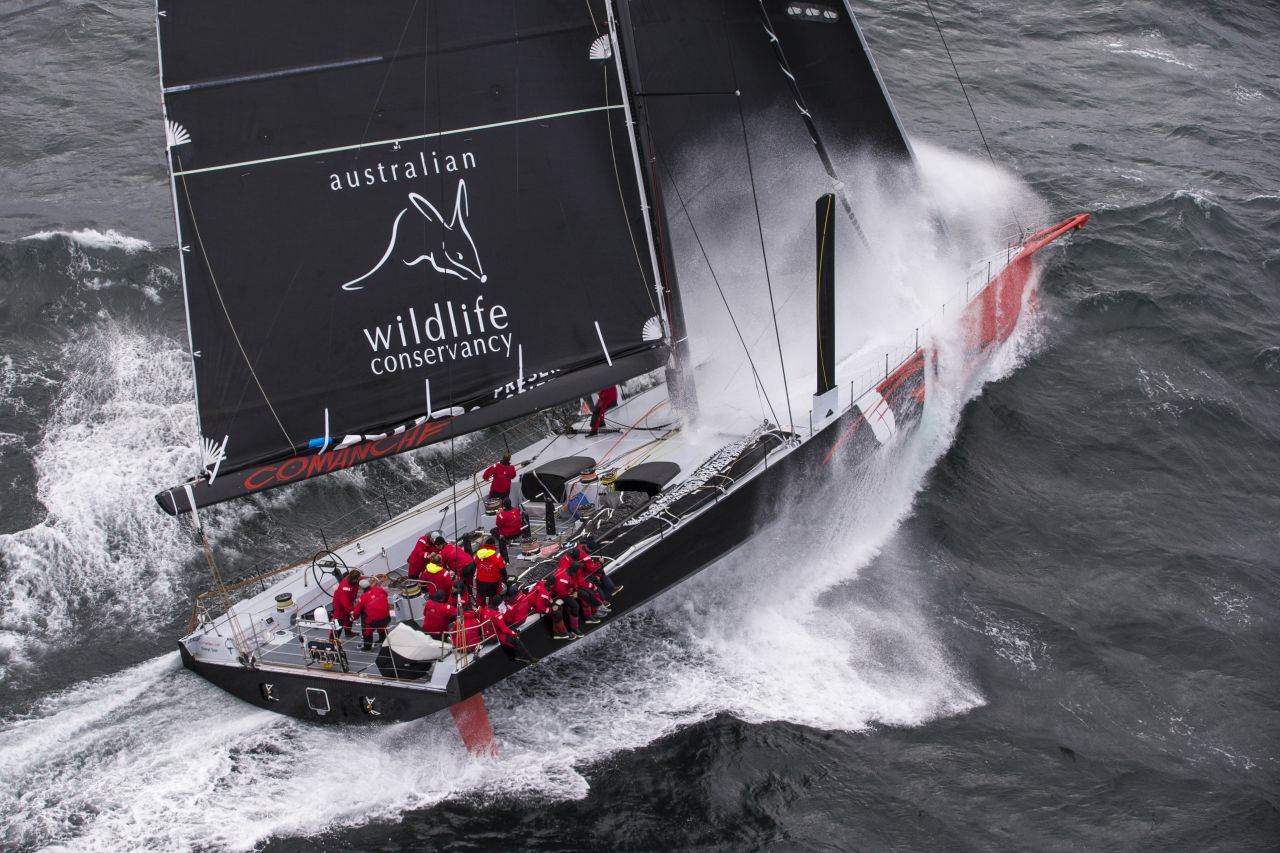 100-foot sloop Comanche touches 30 knots on a training run for the Sydney to Hobart race and is pictured from a helicopter.